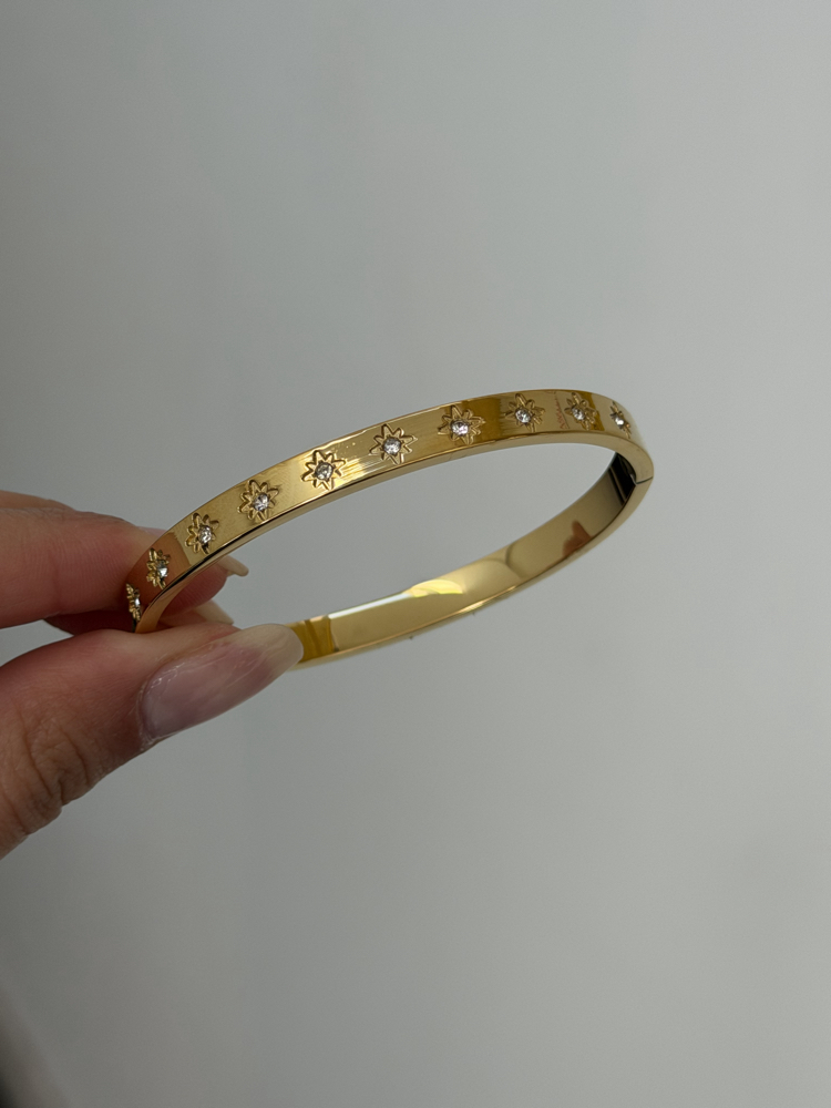 Çelik Kutup Yıldızı İşlemeli Kelepçe | Gold