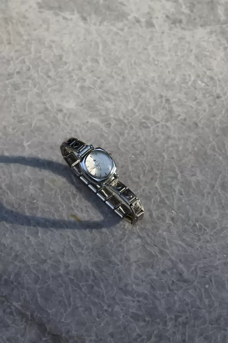 Çelik Silver Kalpli Nomi Charm Beyaz Kadın Saat