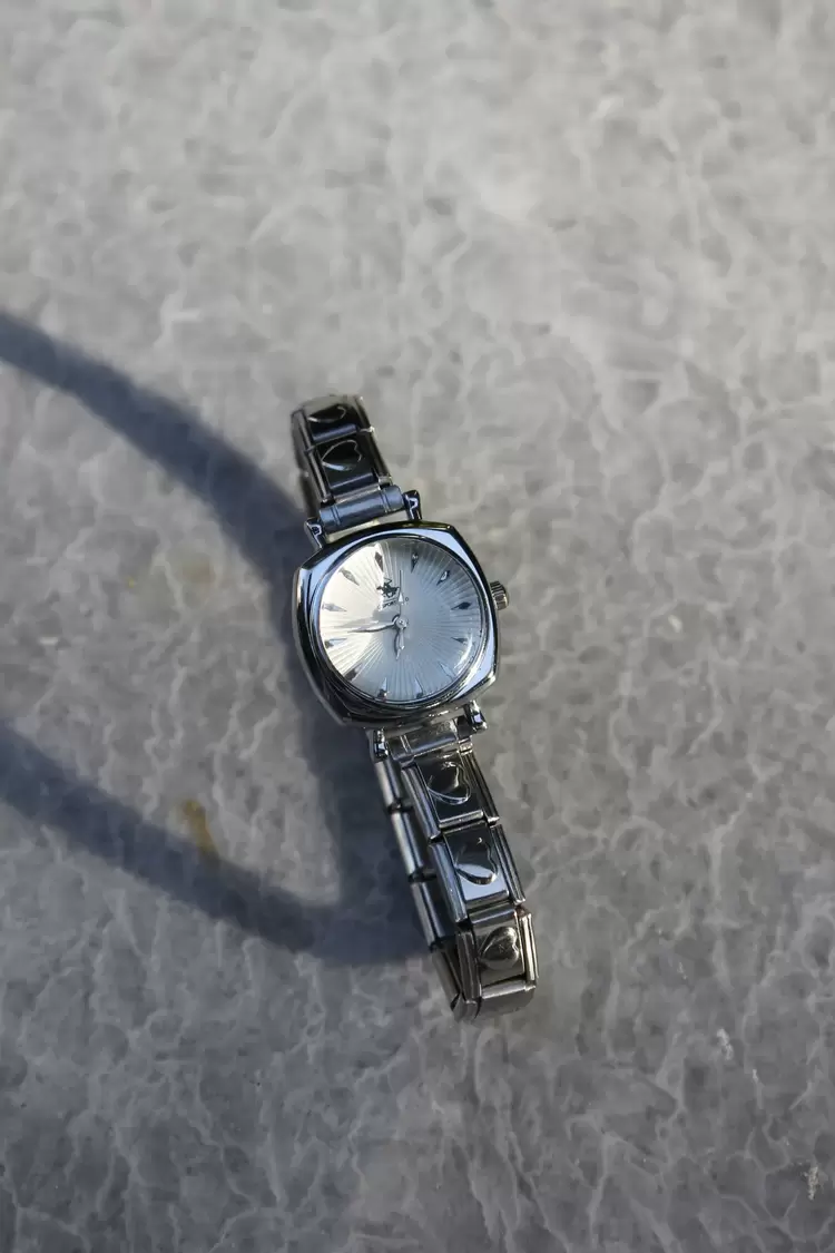 Çelik Silver Kalpli Nomi Charm Beyaz Kadın Saat