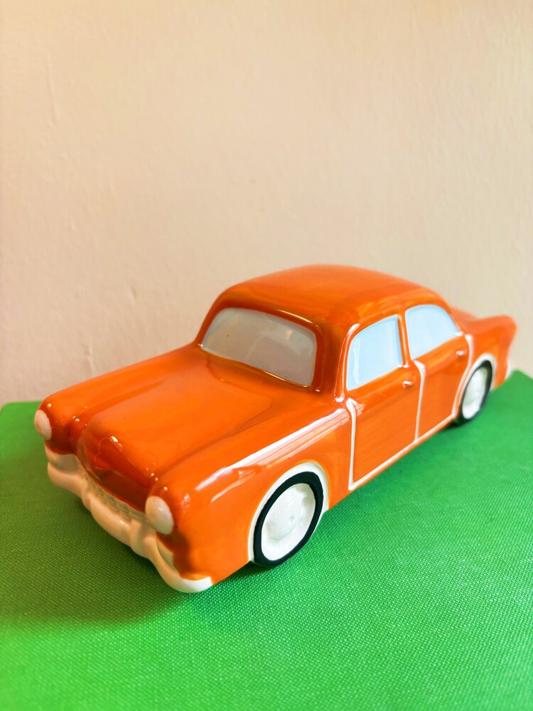 Limited Edition Orange Cadillac Figurine 