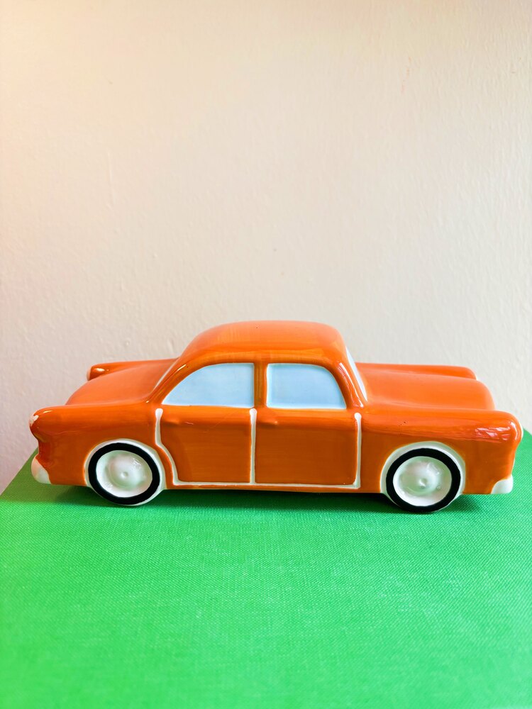 Limited Edition Orange Cadillac Figurine 