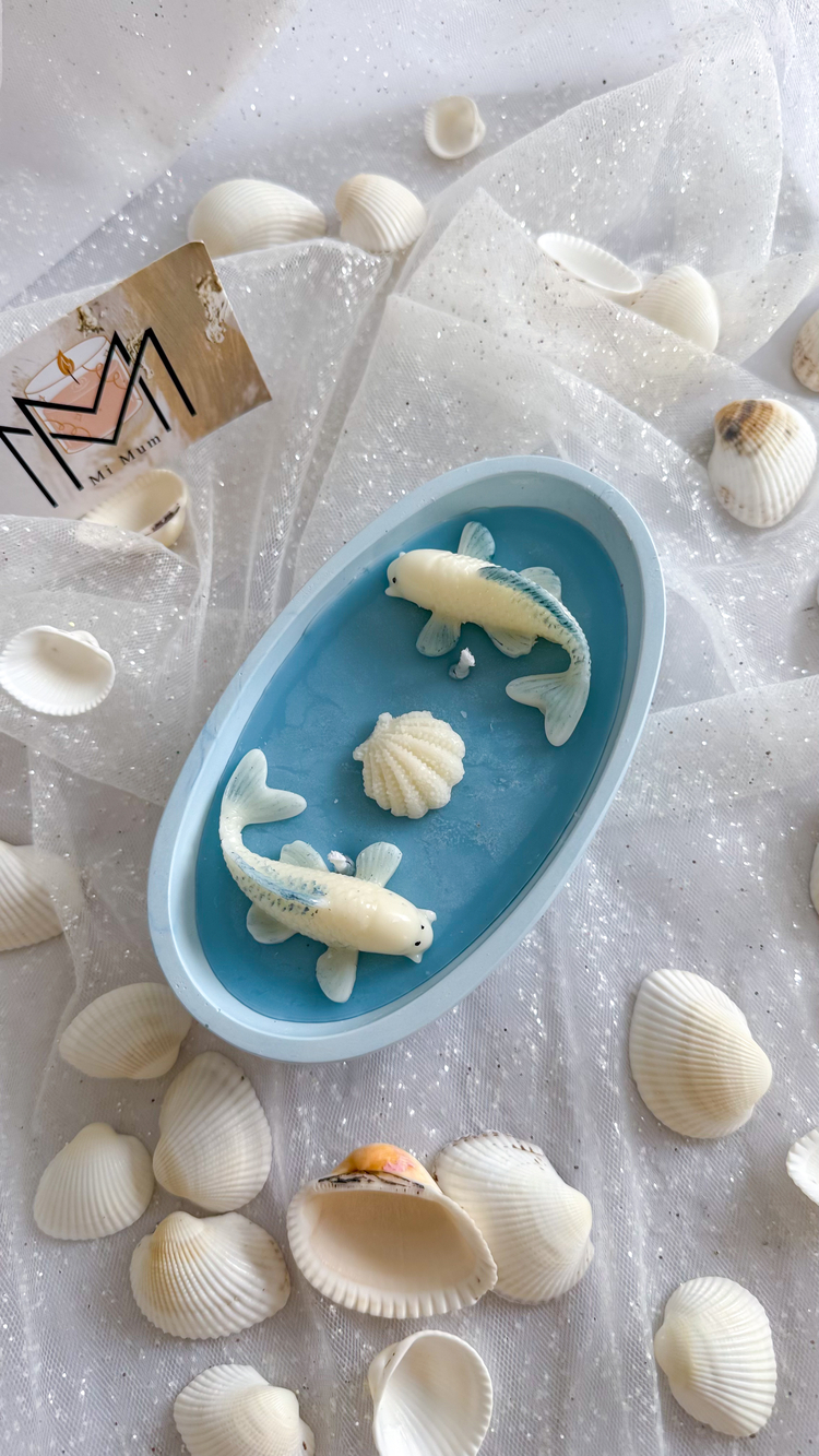 Taş tozu ve balık figürlü mum