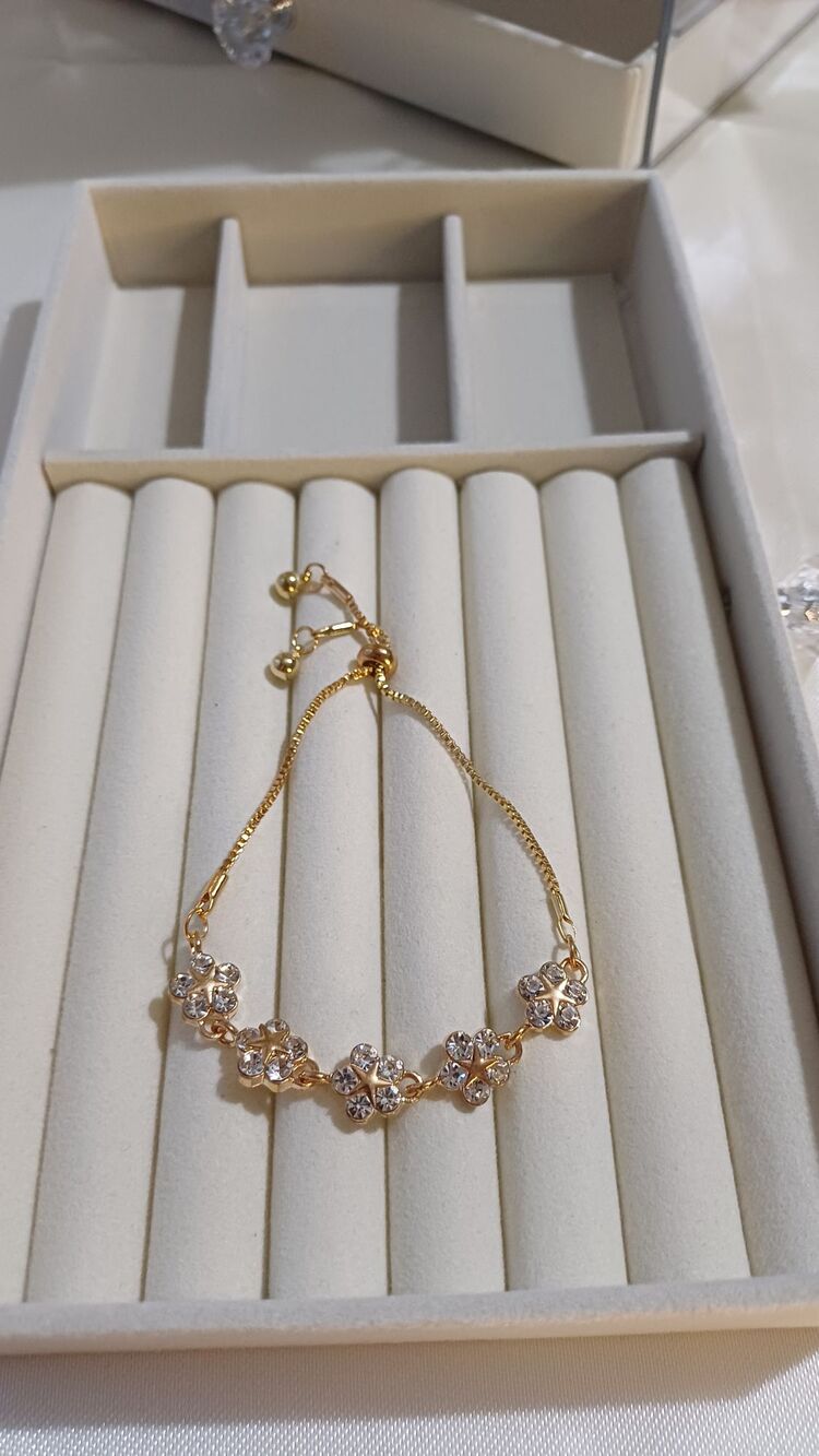 Çiçek taşlı gold bileklik 