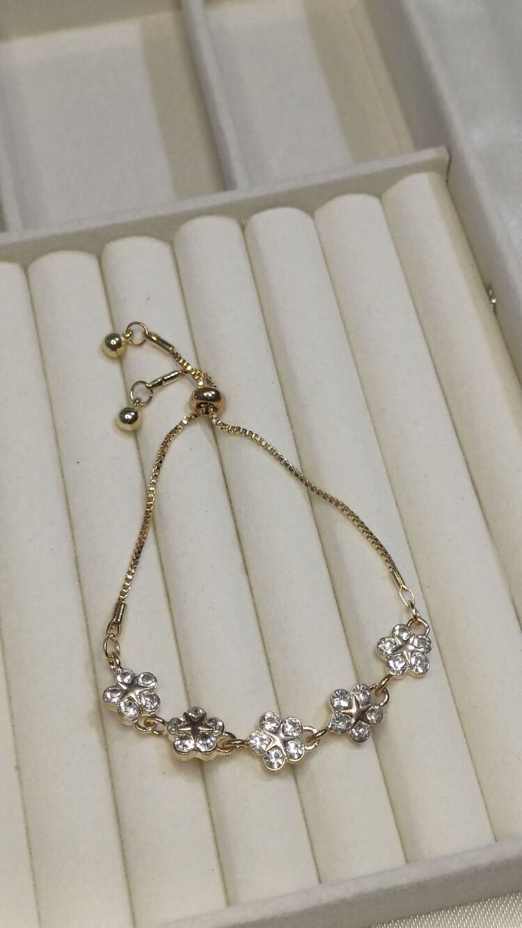 Çiçek taşlı gold bileklik 