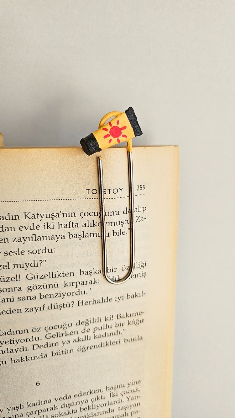 GÜNEŞ KREMİ KİTAP AYRACI