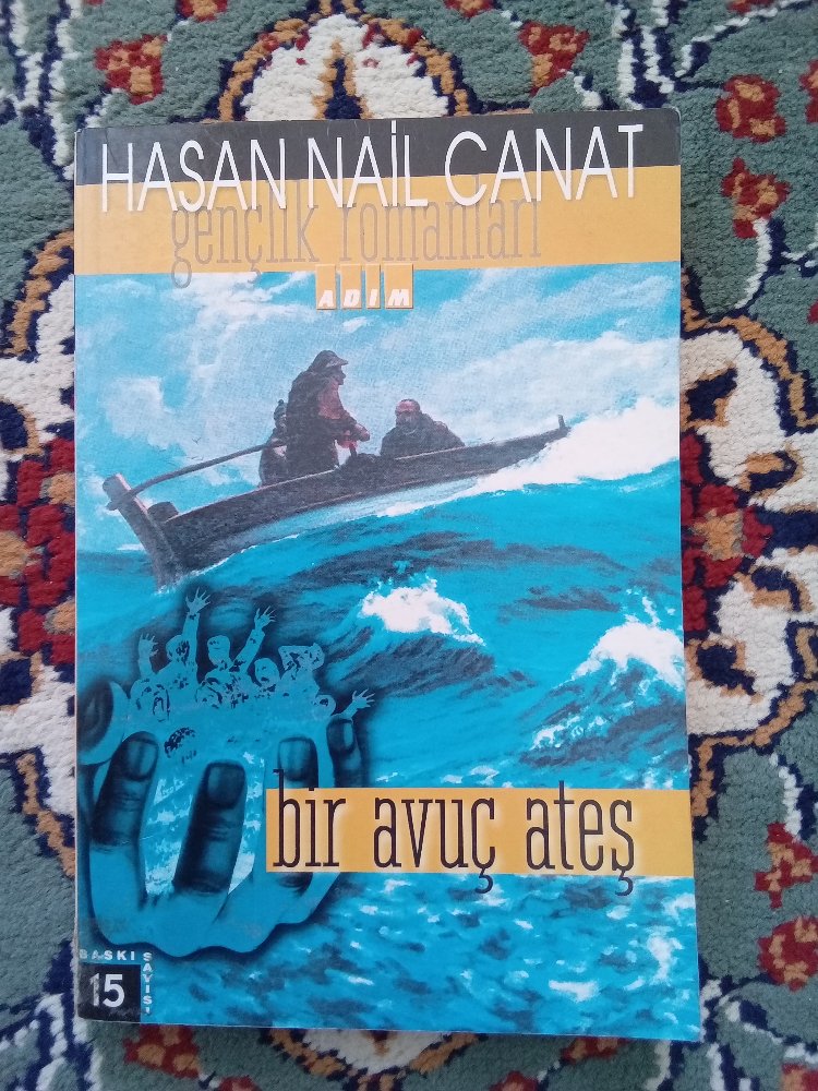 bir avuç ateş(Hasan Nail Canat)