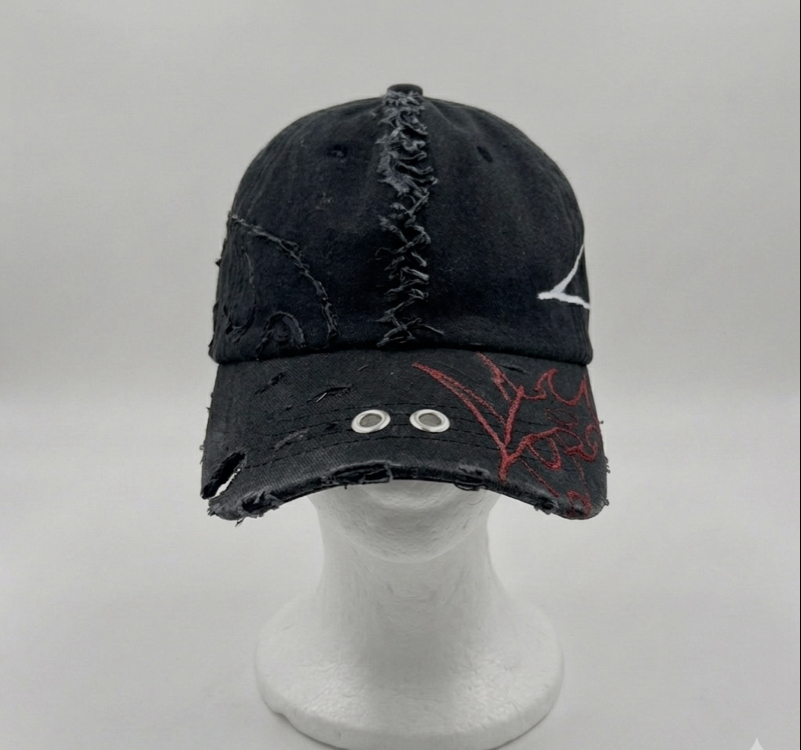 red and white tribal design cap