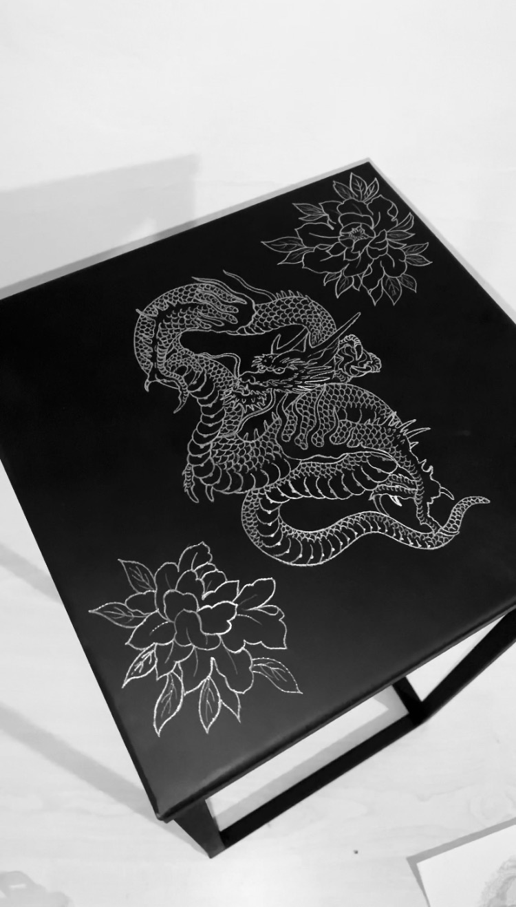 Custom engraved metal unique table.