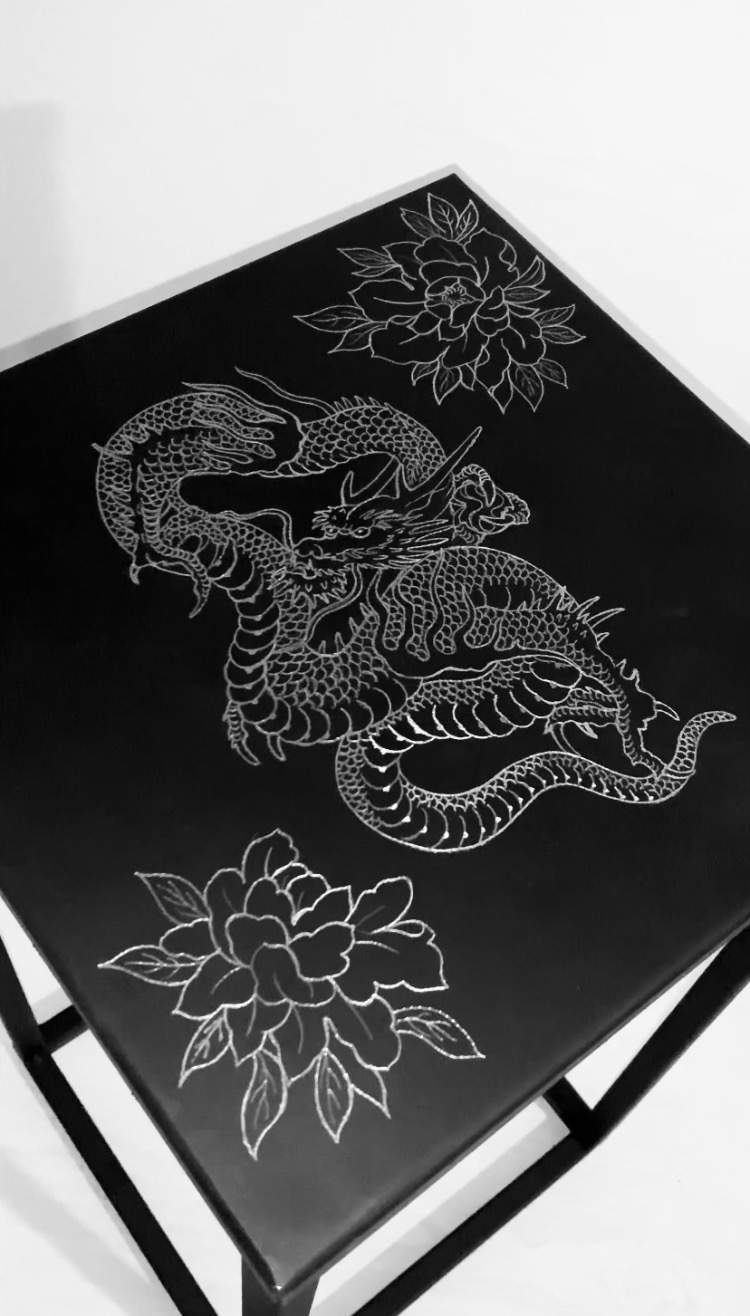 Custom engraved metal unique table.