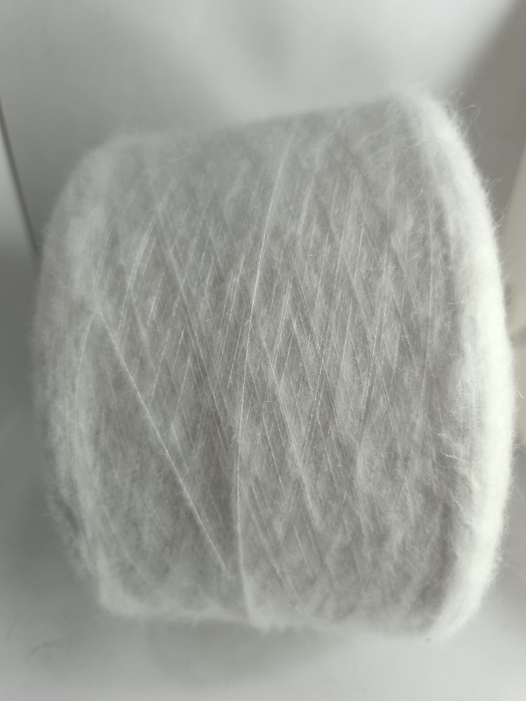 %12 Kid moher %15 Merino %12 Viskon %45 Polyamid %14 Polyester %2 Elastan 300gr