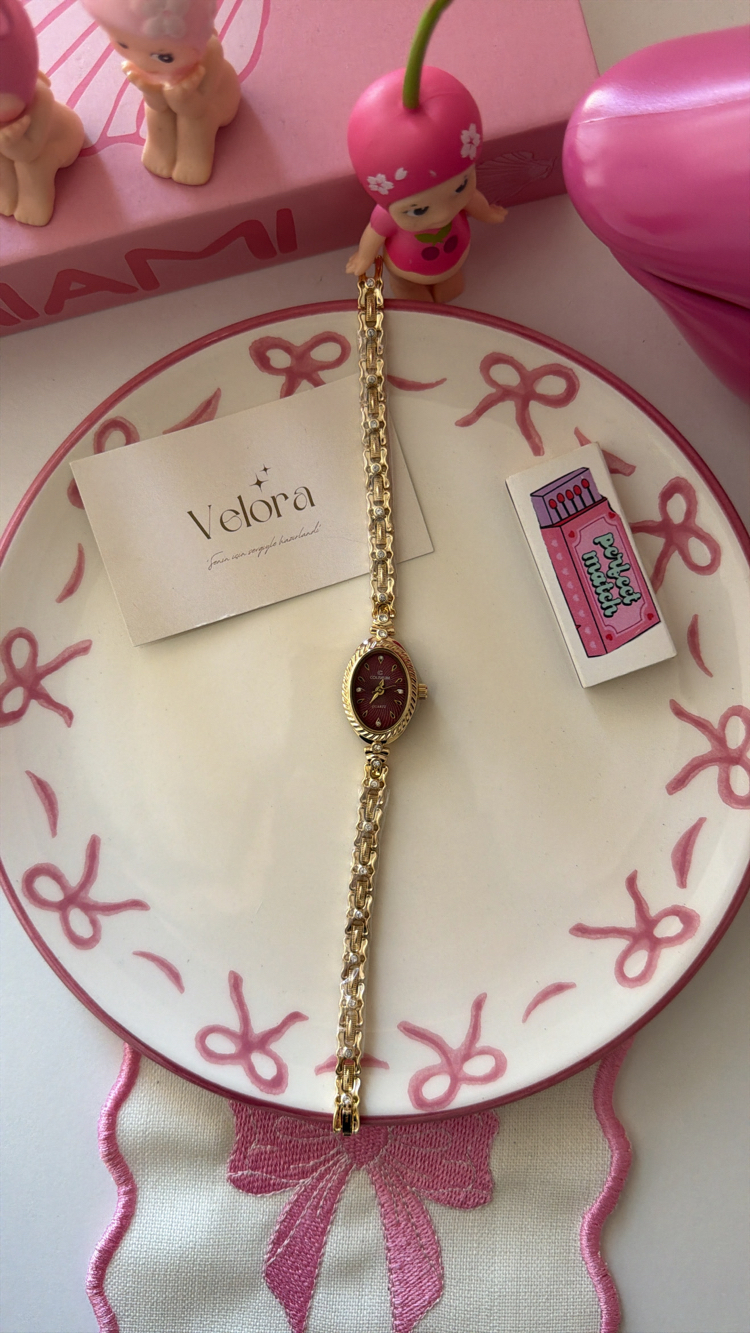 Gold bordo luris saat