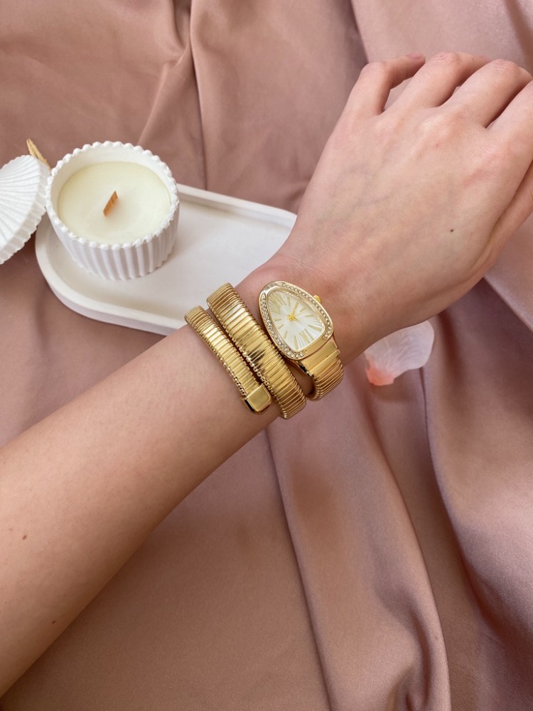 gold yılan model tasarım saat