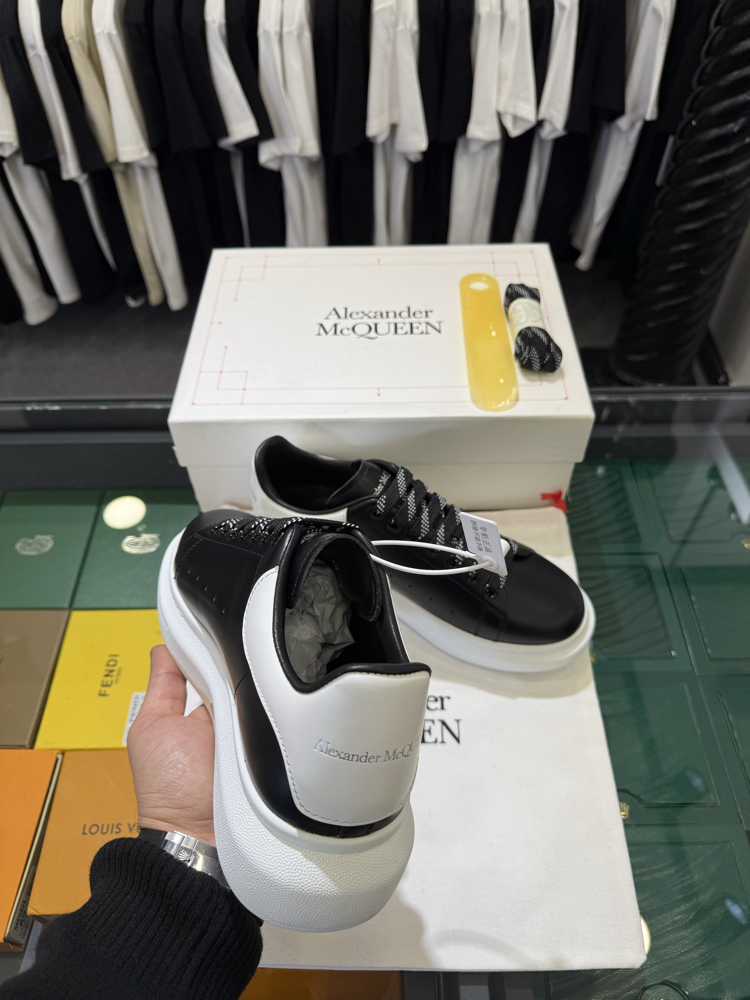 Alexander McQueen Sneaker in Black Leather with White Heel Tab
