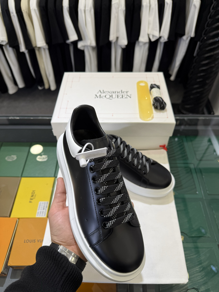 Alexander McQueen Sneaker in Black Leather with White Heel Tab