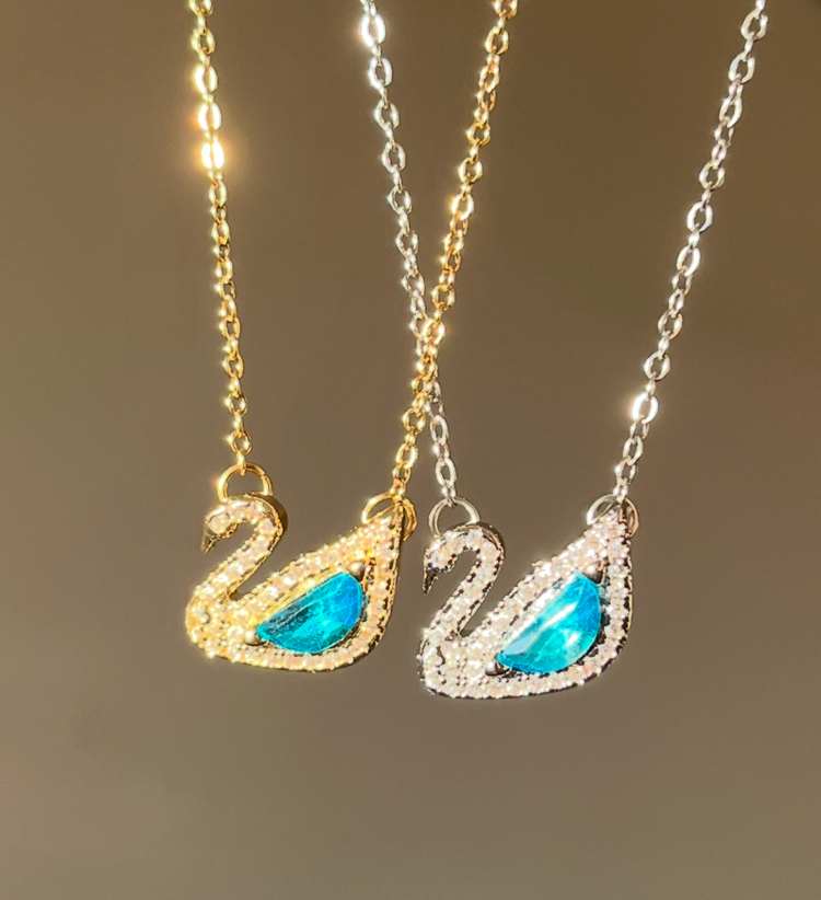 çelik swarovski dazzling swan mavi taşlı gold kolye 