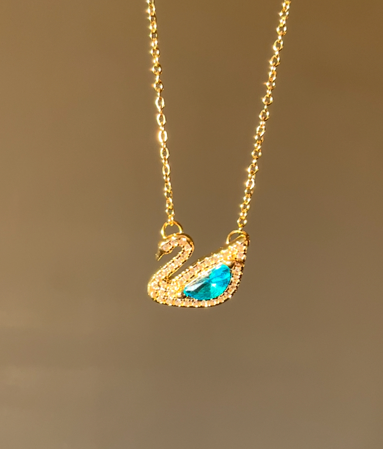 çelik swarovski dazzling swan mavi taşlı gold kolye 