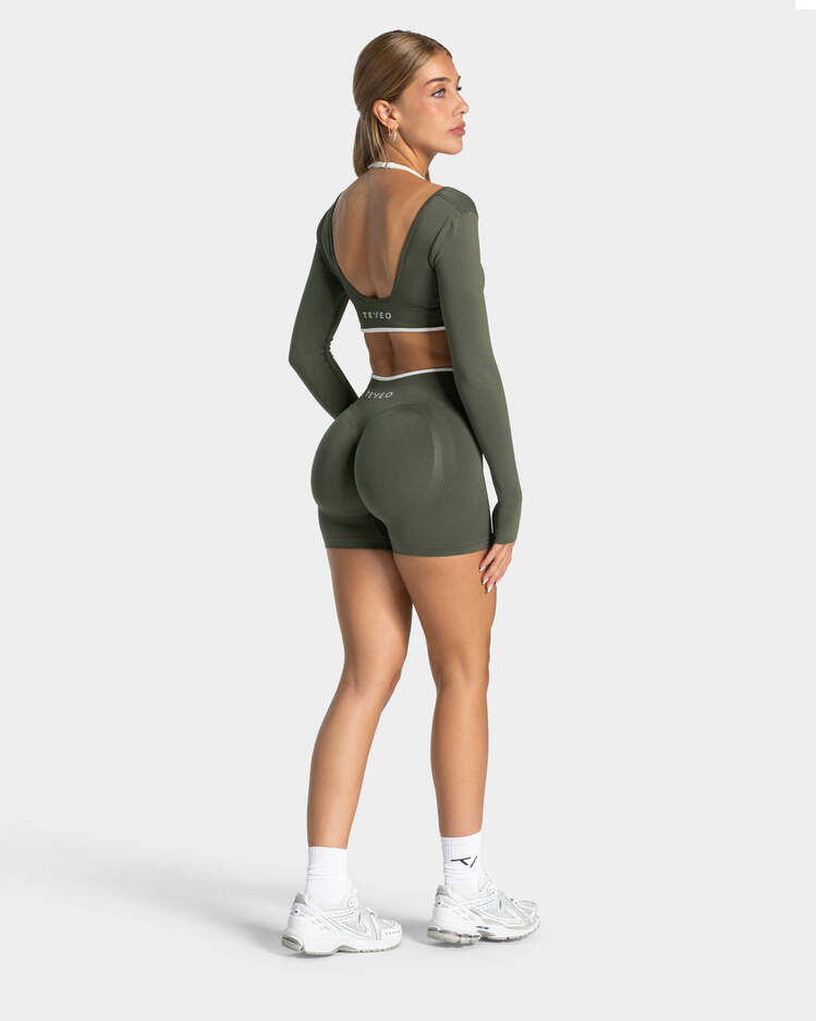 Teveo Zeytin Yeşili Uzun Kollu Crop Top - Beyaz Biyeli Seamless Tasarım