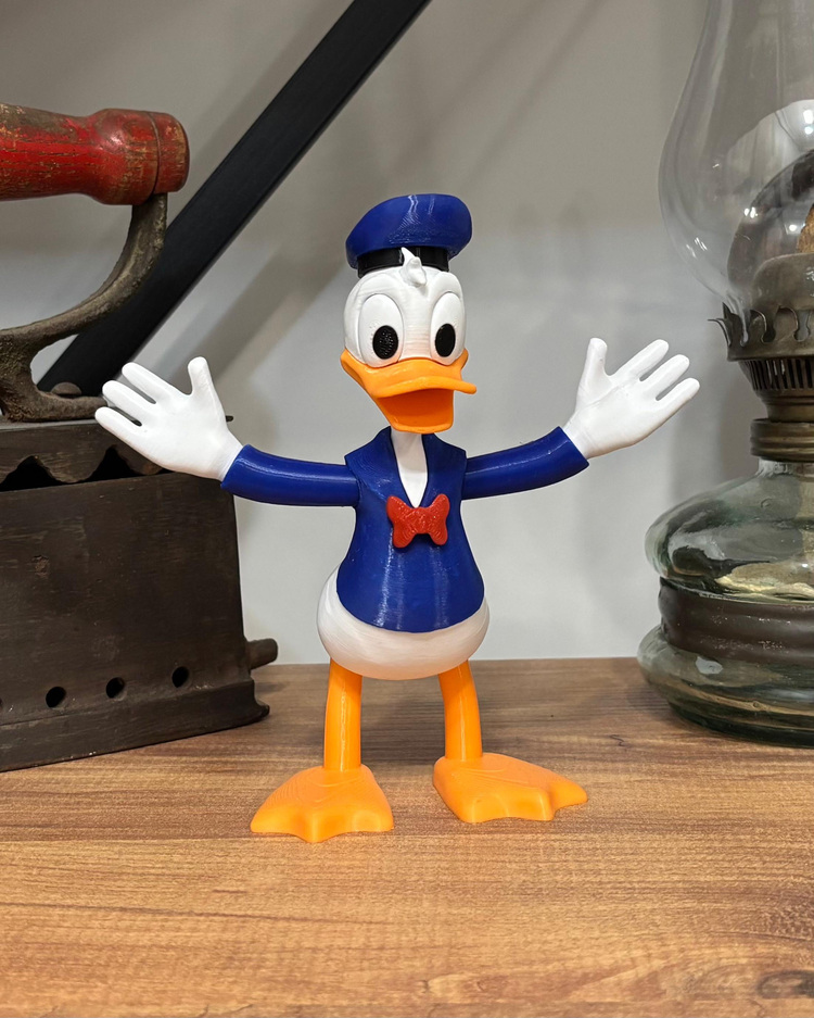 Donald Duck Koleksiyon Figürü – Dekoratif Oyuncak – Masaüstü / Kitaplık Süs Eşyası