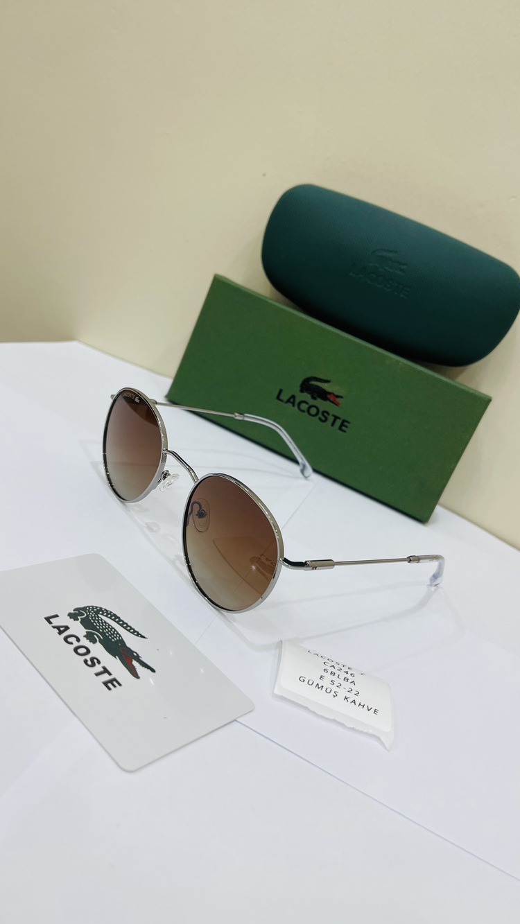 LACOSTE GÜMÜŞ ÇERÇEVE KAHVE ŞEFFAF CAM