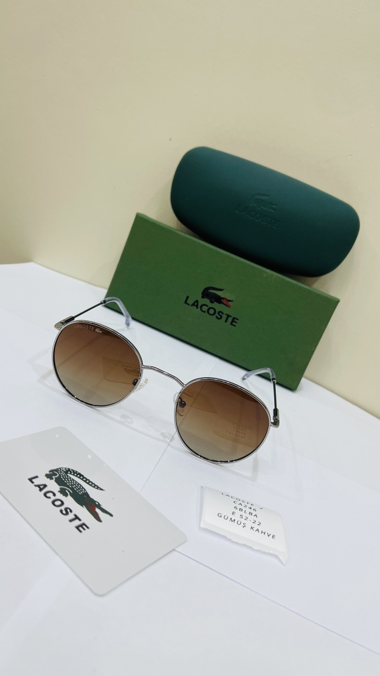 LACOSTE GÜMÜŞ ÇERÇEVE KAHVE ŞEFFAF CAM